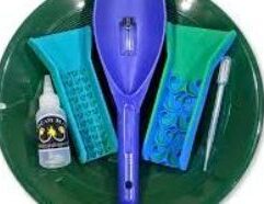 Gold Pan Kit with Pocket Sluice Combo - Dream Mat Description: Gold Pan Kit with Pocket Sluice Combo This is a Great Kit for Kids to Pros! Using the Dream Mat Pocket Sluices to gather the concentrates to then pan out, turns even a child into an expert at collecting fine gold! It takes years to develop good panning techniques for fine gold in heavy black sands! But with Dream Mats PROVEN World Class Recovery, it's soooo easy for anyone to use these little sluices to catch gold! Tested & proven by seasoned prospectors, these sluices are hard to out pan! They catch the fines gold & do all the work, so you can have all the fun! If you're a parent buying this kit for your child, you better buy an extra pocket sluice for yourself, because you're going to get jealous when the kids find more gold! For pros on the go, this kit fits in your pack or under the seat in your vehicle. So, if you are out exploring & find that good looking spot, you got what you need to find the gold! Comes with cargo net pouch to keep it all together! Colors of sluices & shovels will vary! 12" GREEN or BLUE GOLD PAN PROSPECTORS SAND SCOOP MINI POCKET SLUICE MICRO POCKET SLUICE SNUFFER BOTTLE VIAL SNUFFER GOLD VIAL CARGO NET CARRY POUCH