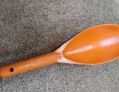 ORANGE TREASURE SCOOP Reinforced plastic scoop designed to recover nuggets and help you locate them in the scoop with your detector. MADEIN THE USA!!