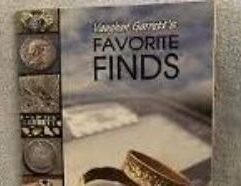 Description Vaughan Garrett's Favorite Finds metal detecting book showcases a decade of customer-submitted finds from Garrett's monthly "Favorite Finds" contest. The book includes color photos and descriptions of hundreds of metal detecting finds, ranging from gold, silver, jewelry, and ancient artifacts. It’s both an inspirational and educational resource for metal detecting enthusiasts. Key Information: Author: Vaughan Garrett (son of the founders of Garrett Metal Detectors). Pages: 140 pages filled with stories and images of incredible finds. This book celebrates the treasures discovered by metal detector users, making it an inspiring read for hobbyists and professionals alike.